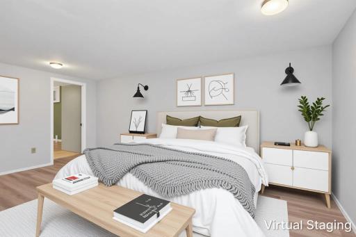 Lower level virtually staged as a bedroom - this space has an egress window and large cedar closet