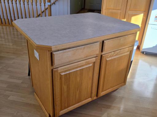 Convenient center island -great for extra seating & storage.