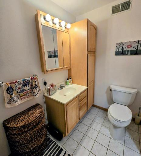 Main floor laundry room also includes half bath.