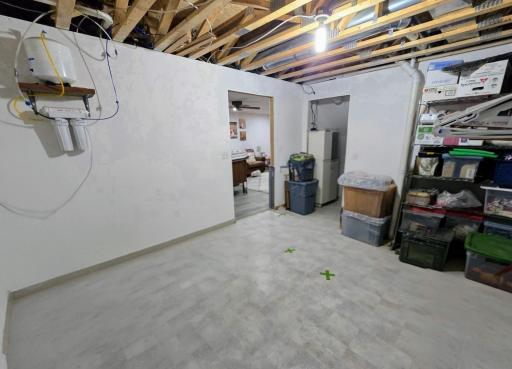 Door to rec room leads into a storage room
