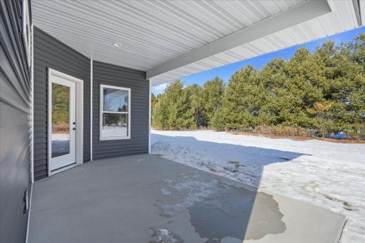 Covered back patio with nice privacy