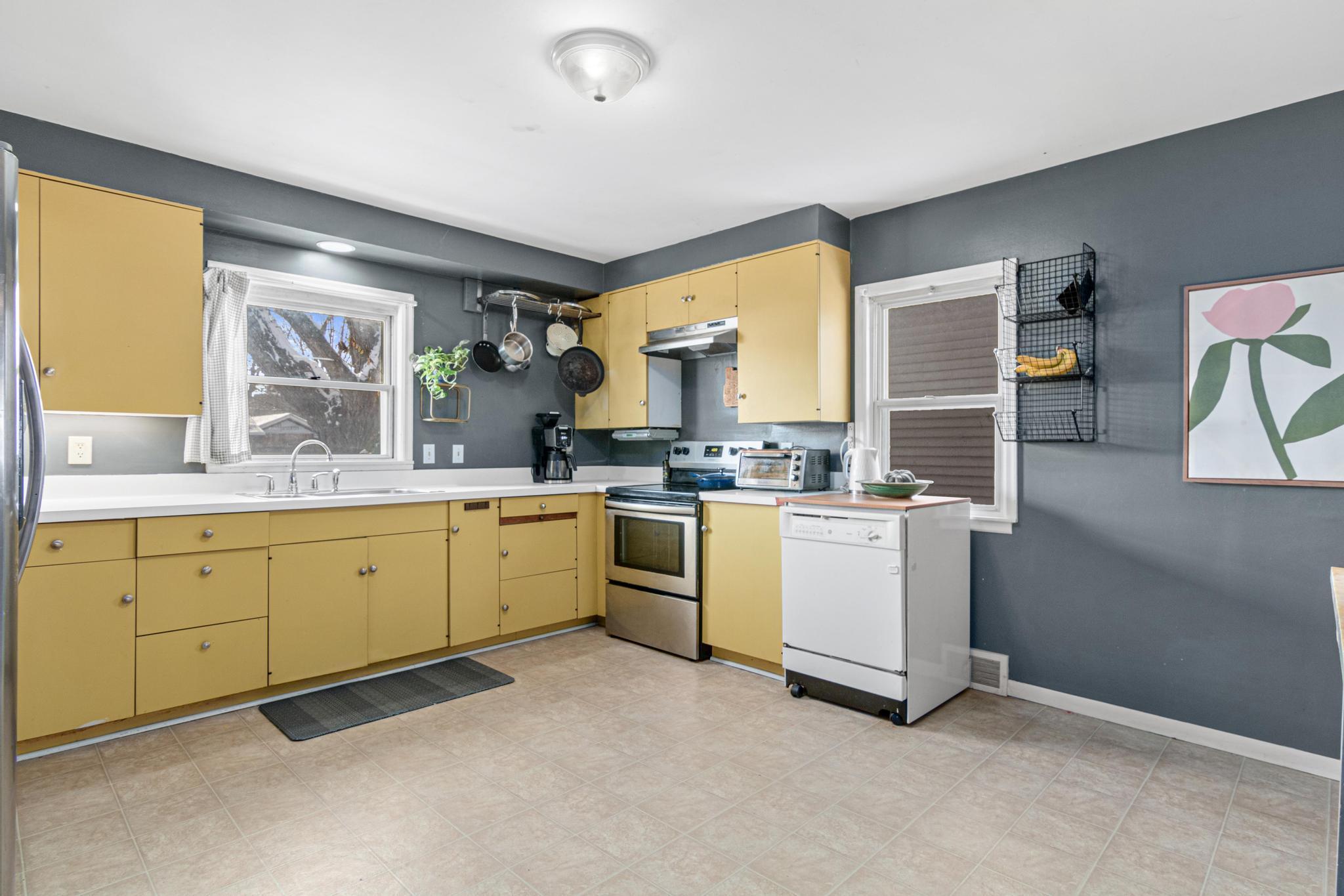 Spacious kitchen with more natural light.