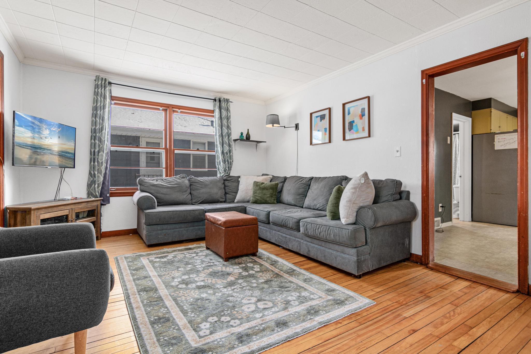 Gorgeous hardwood and natural light greets you and your guests!