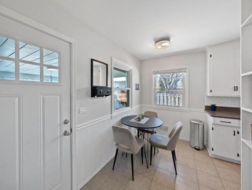 Informal dining just beside the sunroom!