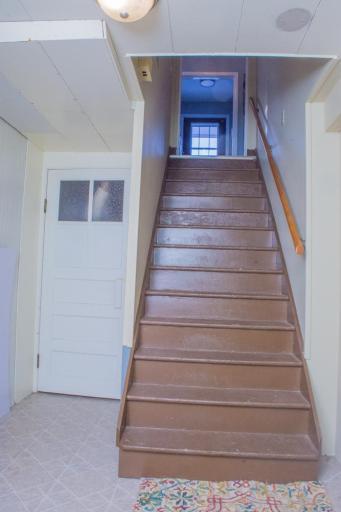 Staircase providing access from the lower level to the main living area.