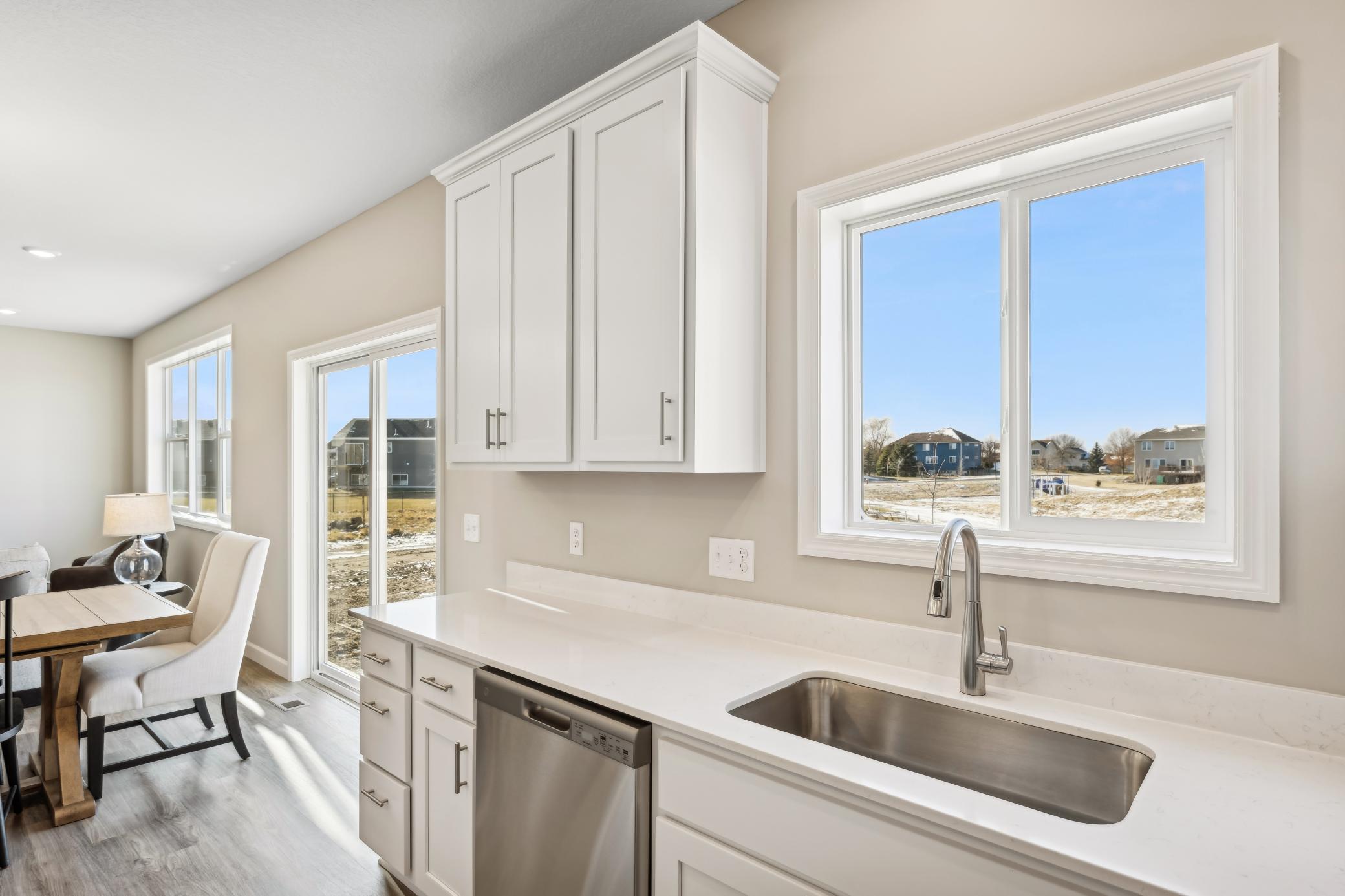 Photos taken from a former model, talk with sales agent about finishes going into home.