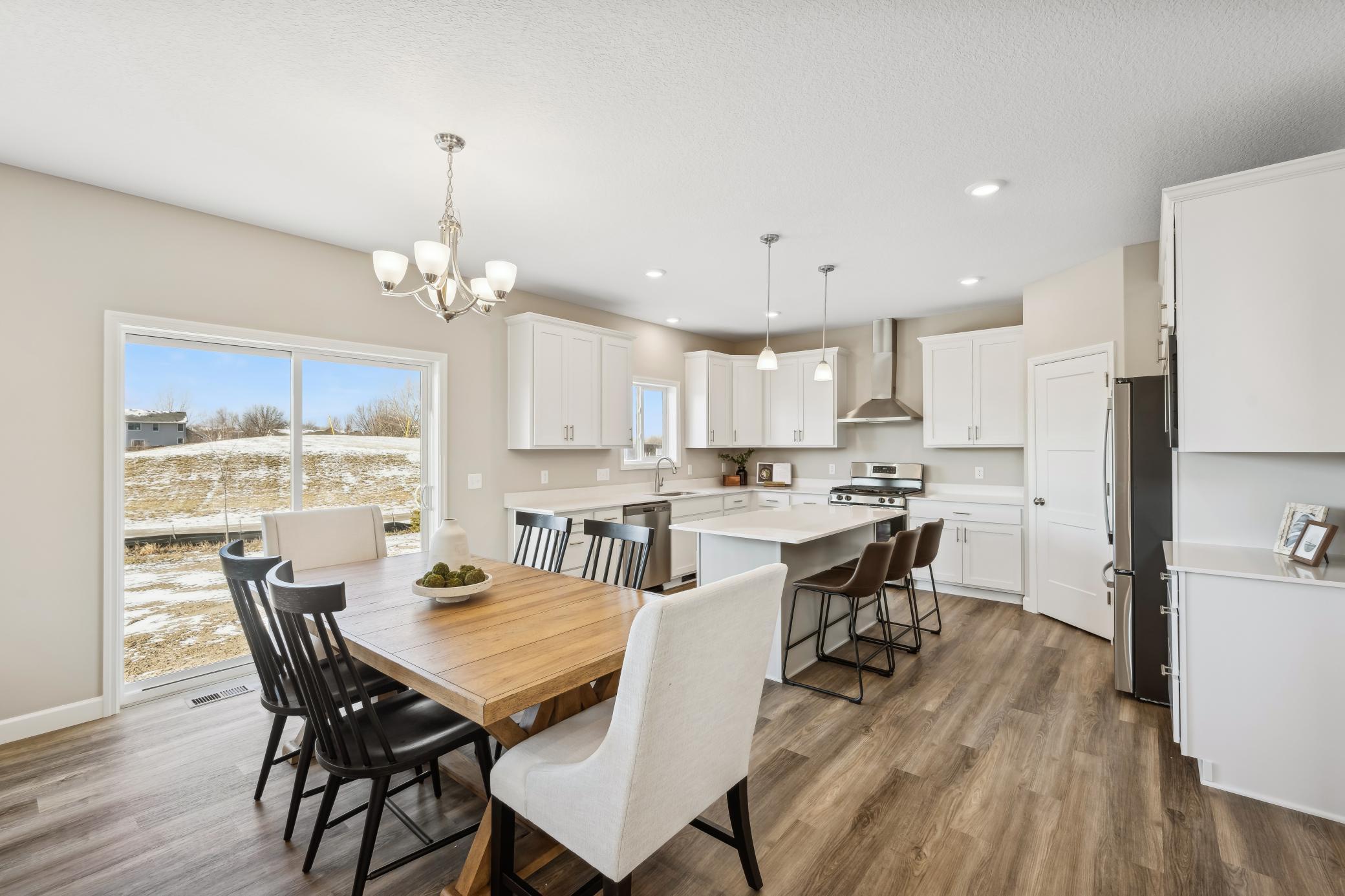 Photos taken from a former model, talk with sales agent about finishes going into home.