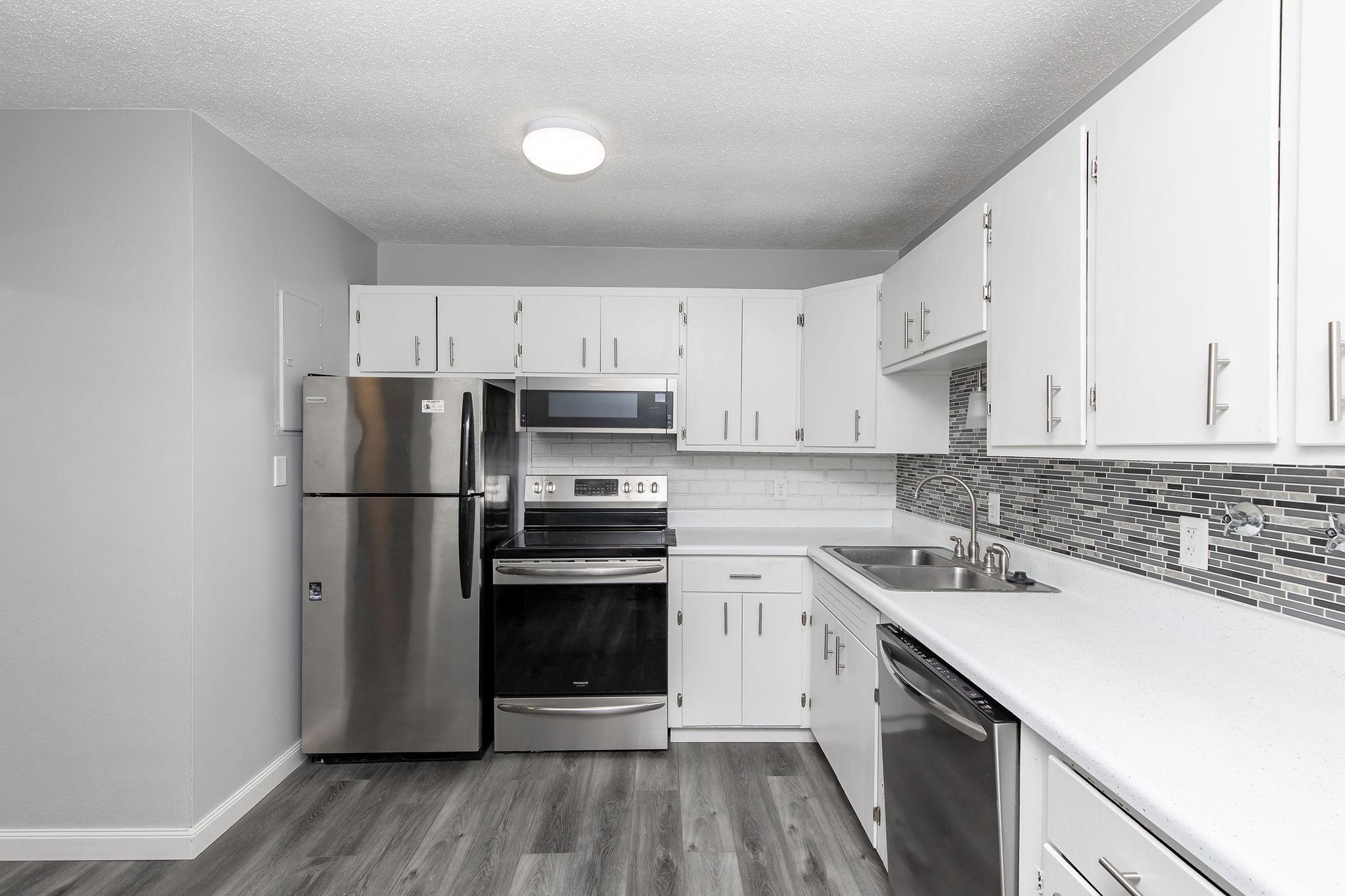 Kitchen w/ stainless steel appliances