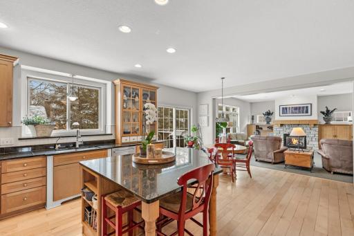 Kitchen flows into the Informal Dining Area and Living Room