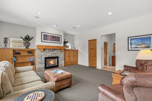Living Room Main Floor Featuring a Gas Fireplace