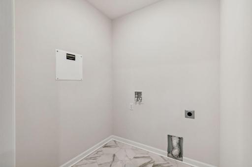 Laundry Room next to the loft area, this space makes it easier to do laundry
