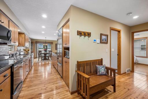 Updated kitchen features granite countertops, stainless steel appliances, and abundant cabinetry.