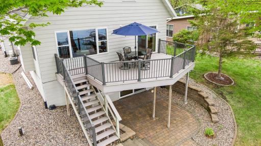 Maintenance-free Trex decking offers an ideal place to enjoy morning coffee, sunsets, and panoramic lake views.