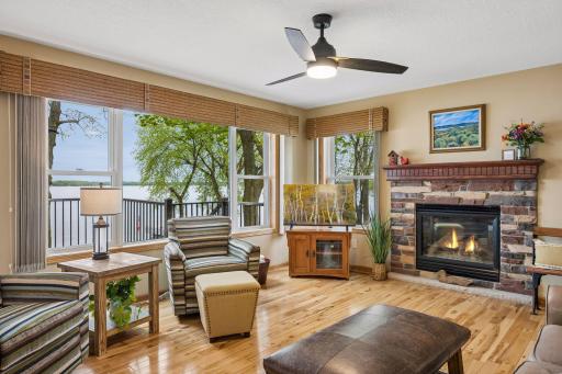 Main living spaces are perfectly positioned to capture panoramic lake views from nearly every angle.