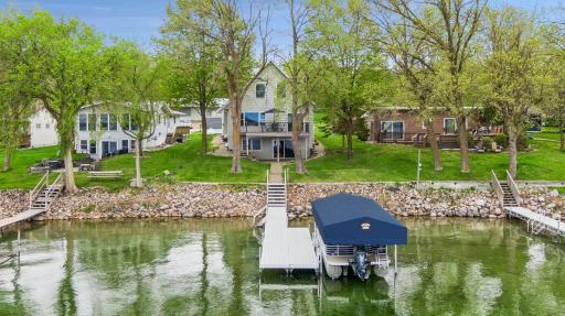 Enjoy a flat backyard with only seven steps to the custom aluminum dock.