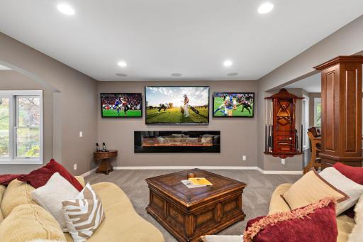 Game day! 3 screens, you will not miss a game. 5 additional T.V's in the lower level