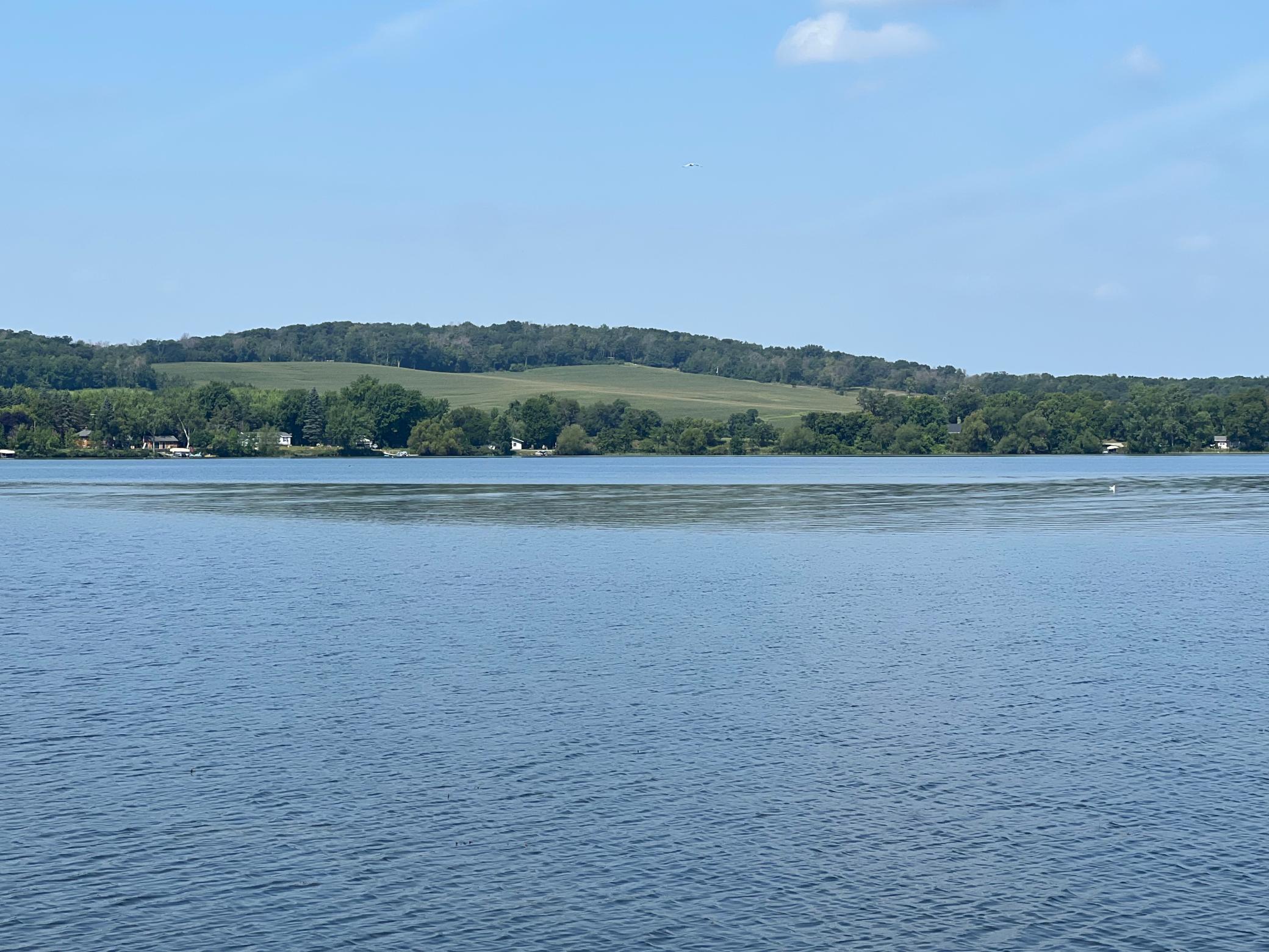 Lake view with rolling hills.