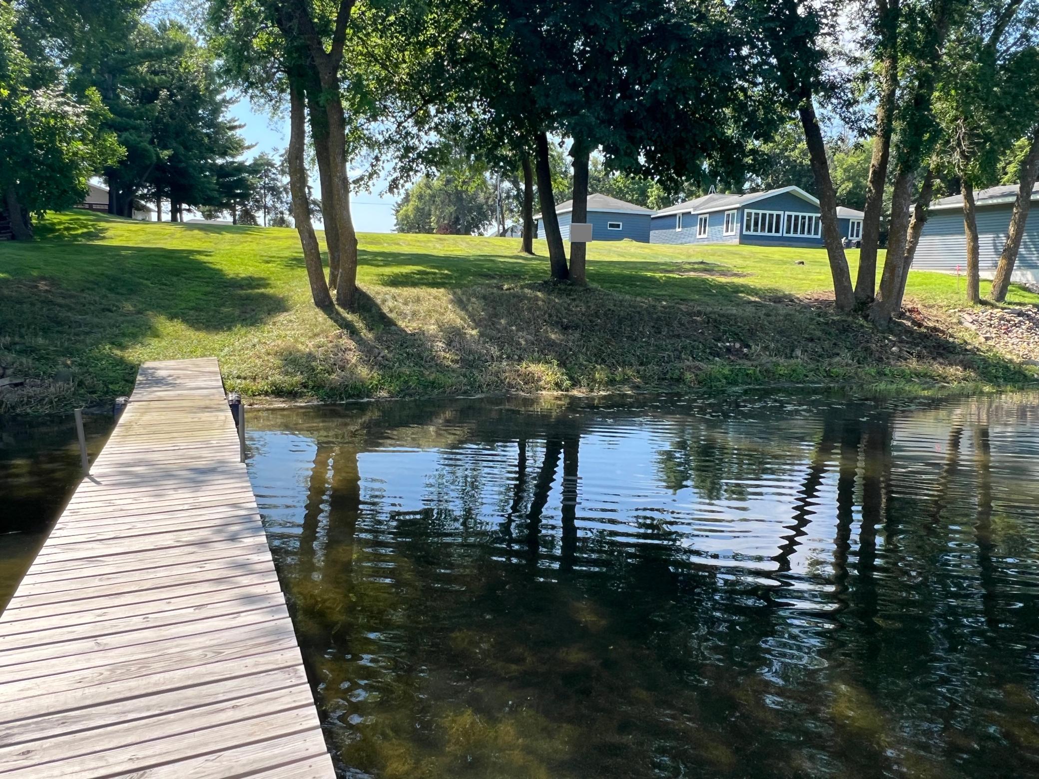 Gentle slope to the lake allows for more privacy at the home/cabin location.