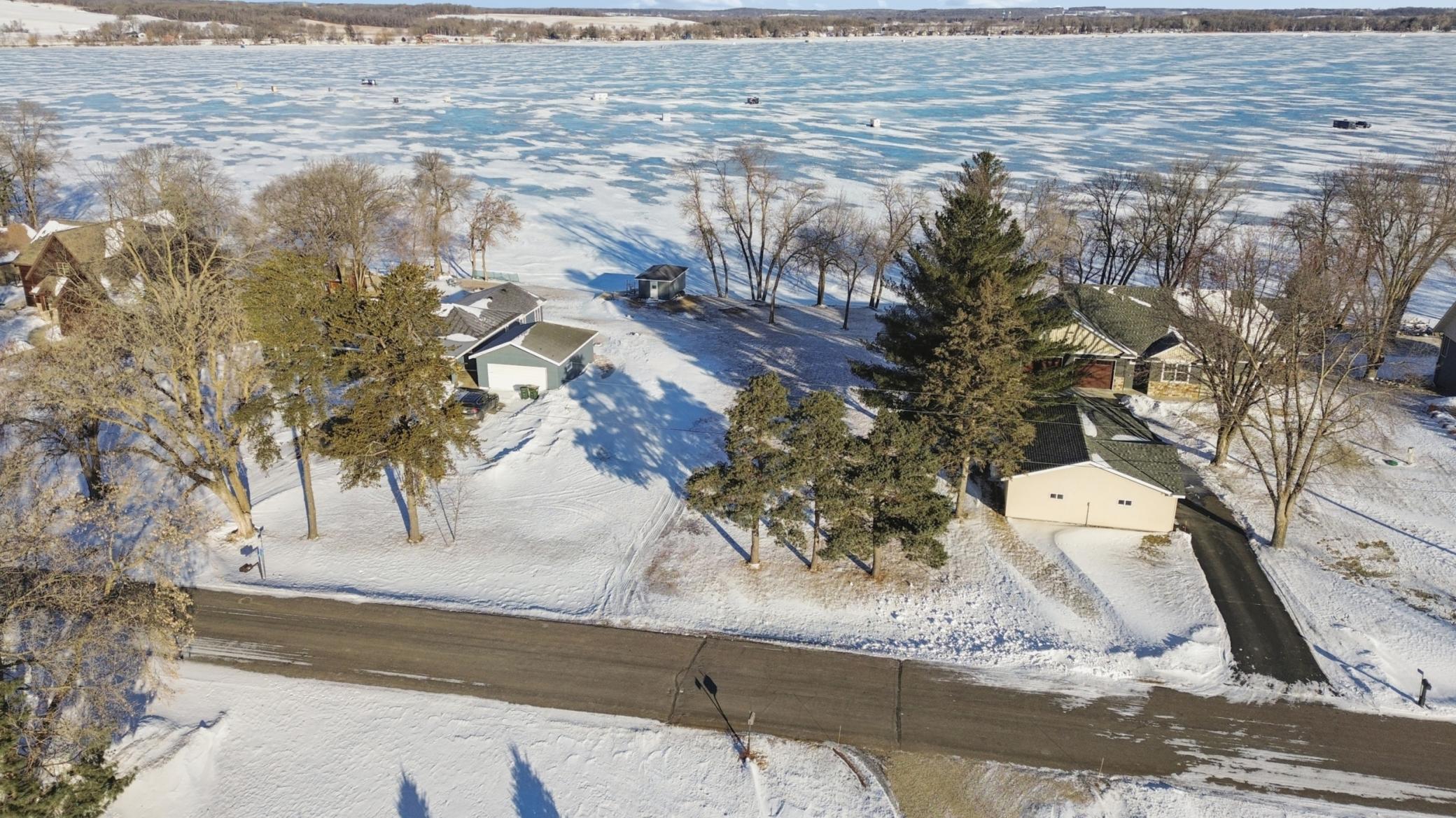 Aerial view of lot and lake.