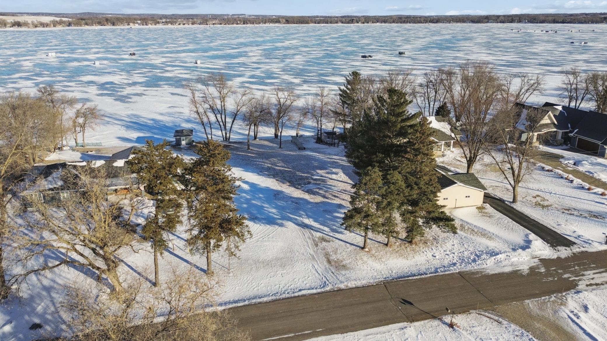 Aerial view of lot and lake.