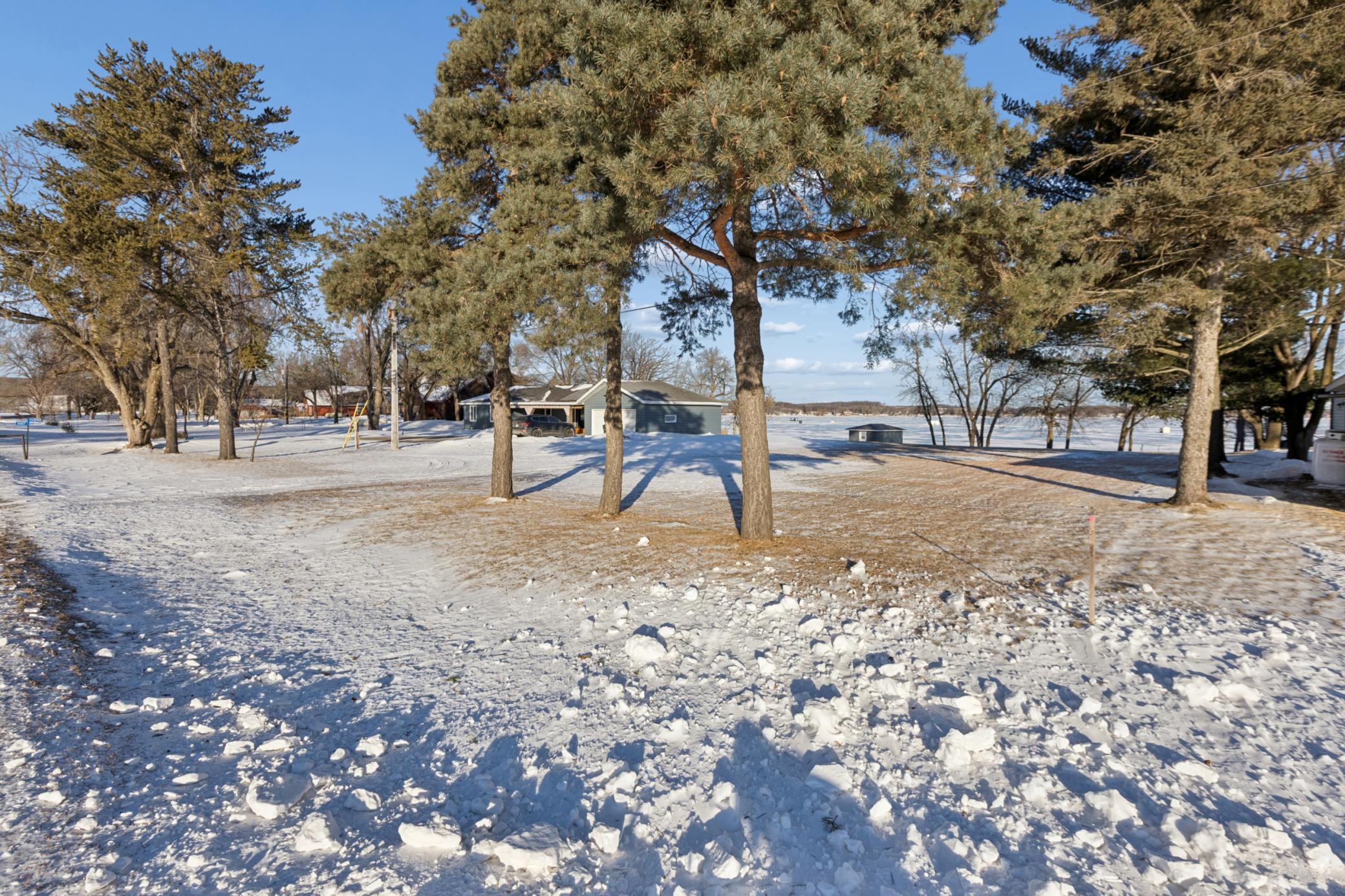 Mature trees grace the landscape.