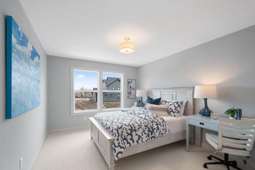 Upper-level bedroom 4 with walk-in closet