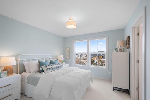 Upper-level bedroom 5 with walk-in closet