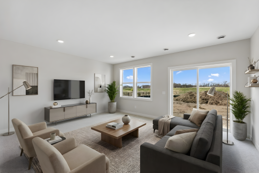 Lower level family room *Photo is virtually staged