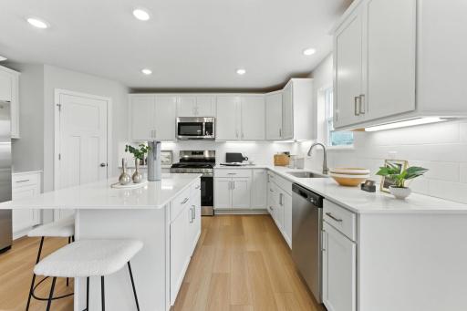 *** ESTIMATED COMPLETION DATE July 2026 ***. Photo of similar home for reference only. Colors and selections will vary. Kingston floorplan. Matching SS GE appliances included! Gas range! Microwave vented to exterior!