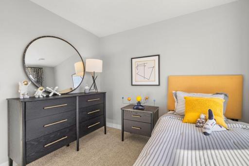 Spacious bedroom #2. Photo is of model home. Colors and options may vary. Ask Sales Agent for details.