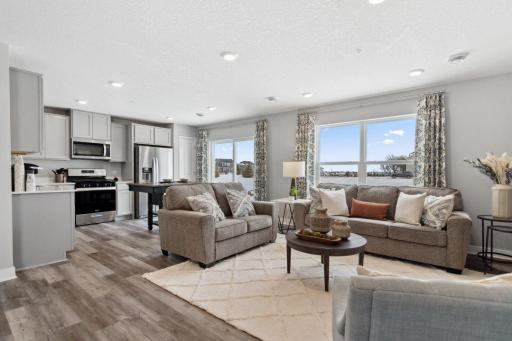 The simplicity of townhome living but the feel of a single-family home. Photo is of model home. Colors and options may vary. Ask Sales Agent for details.