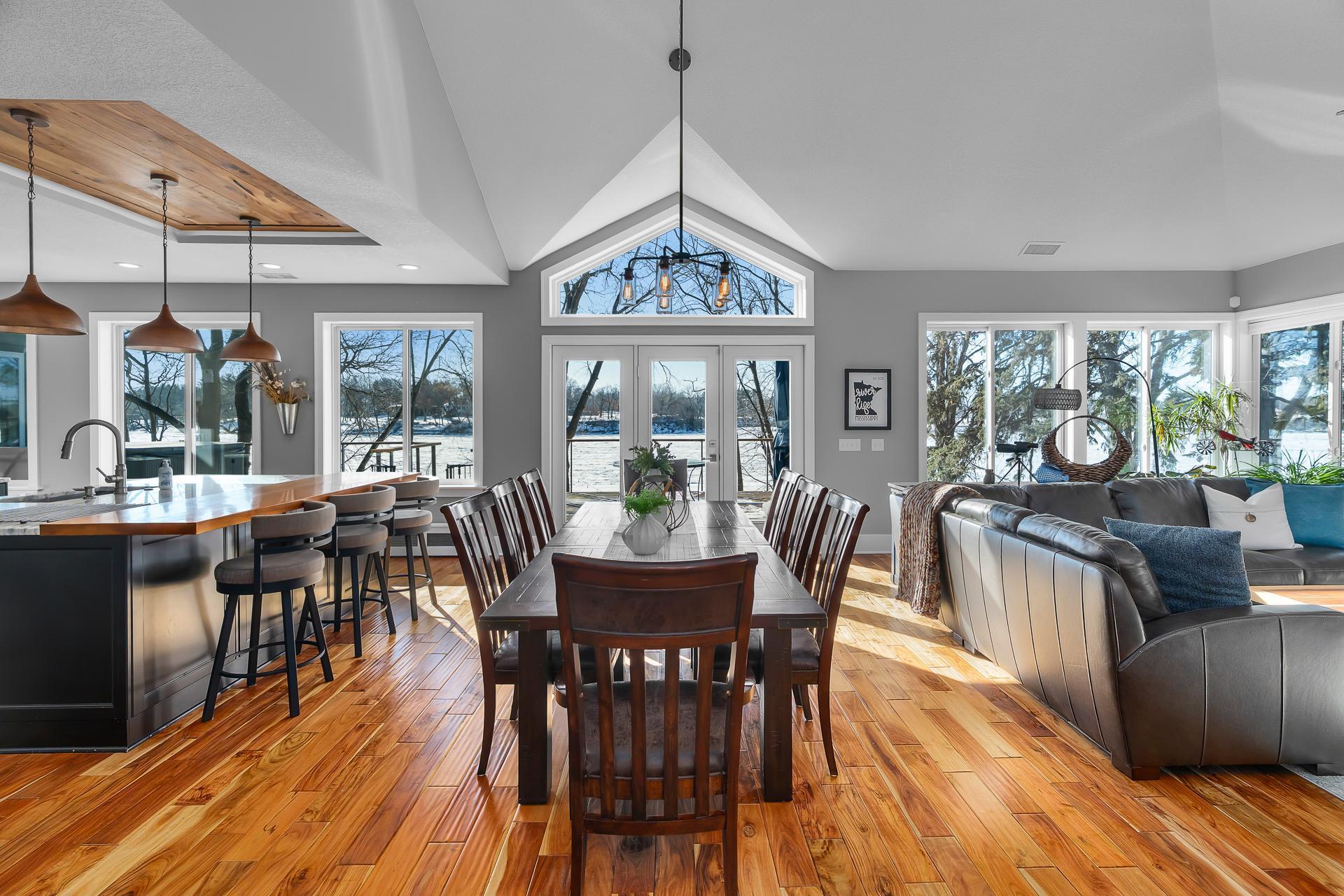 Welcome to 1147 5th Avenue, Anoka. From the moment you walk through the front door you will be captivated by the 16' vaulted ceiling and panoramic views of the Mississippi River!