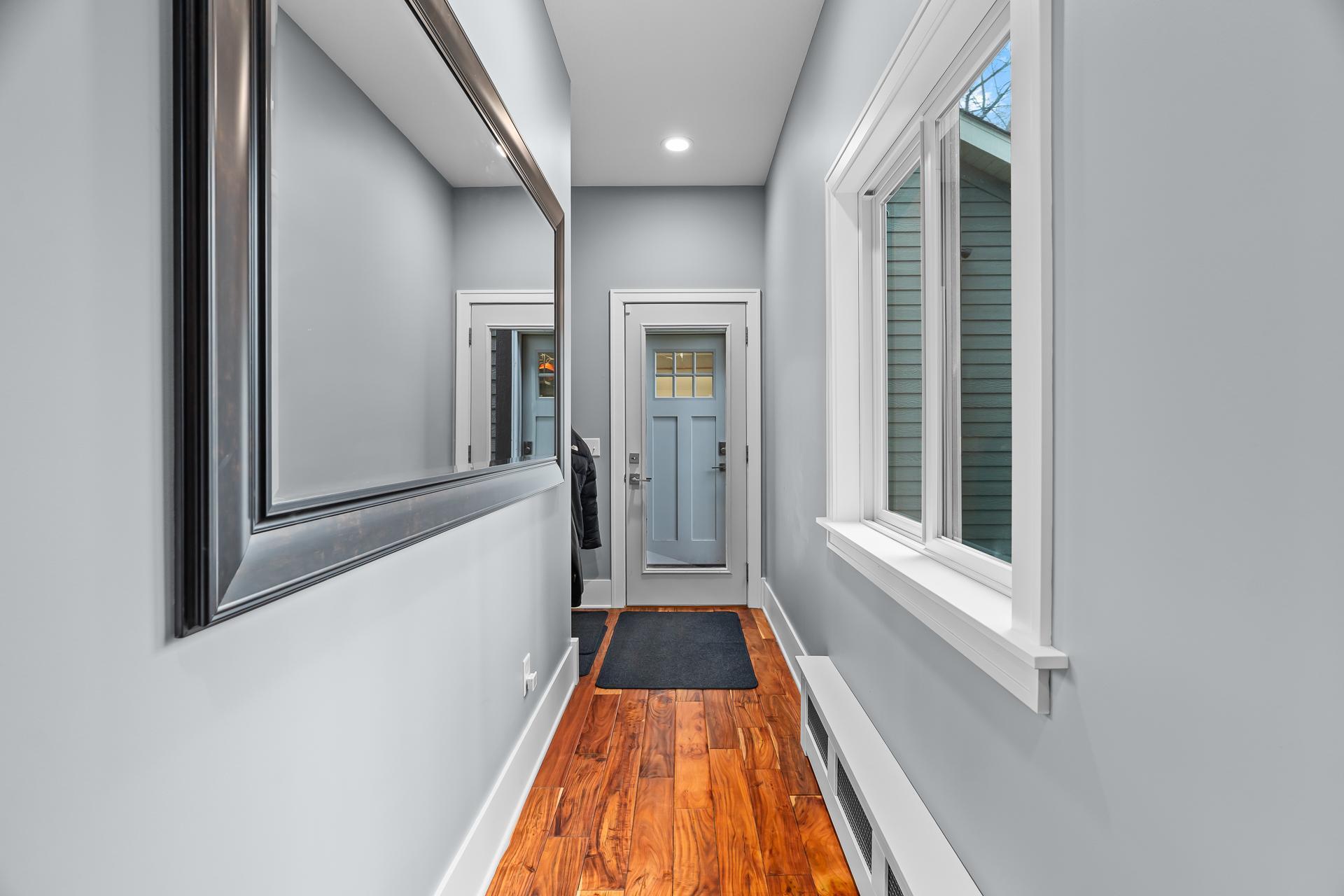 Back entry with Mudroom area at end of hallway. Garage entrance is just a few steps away.