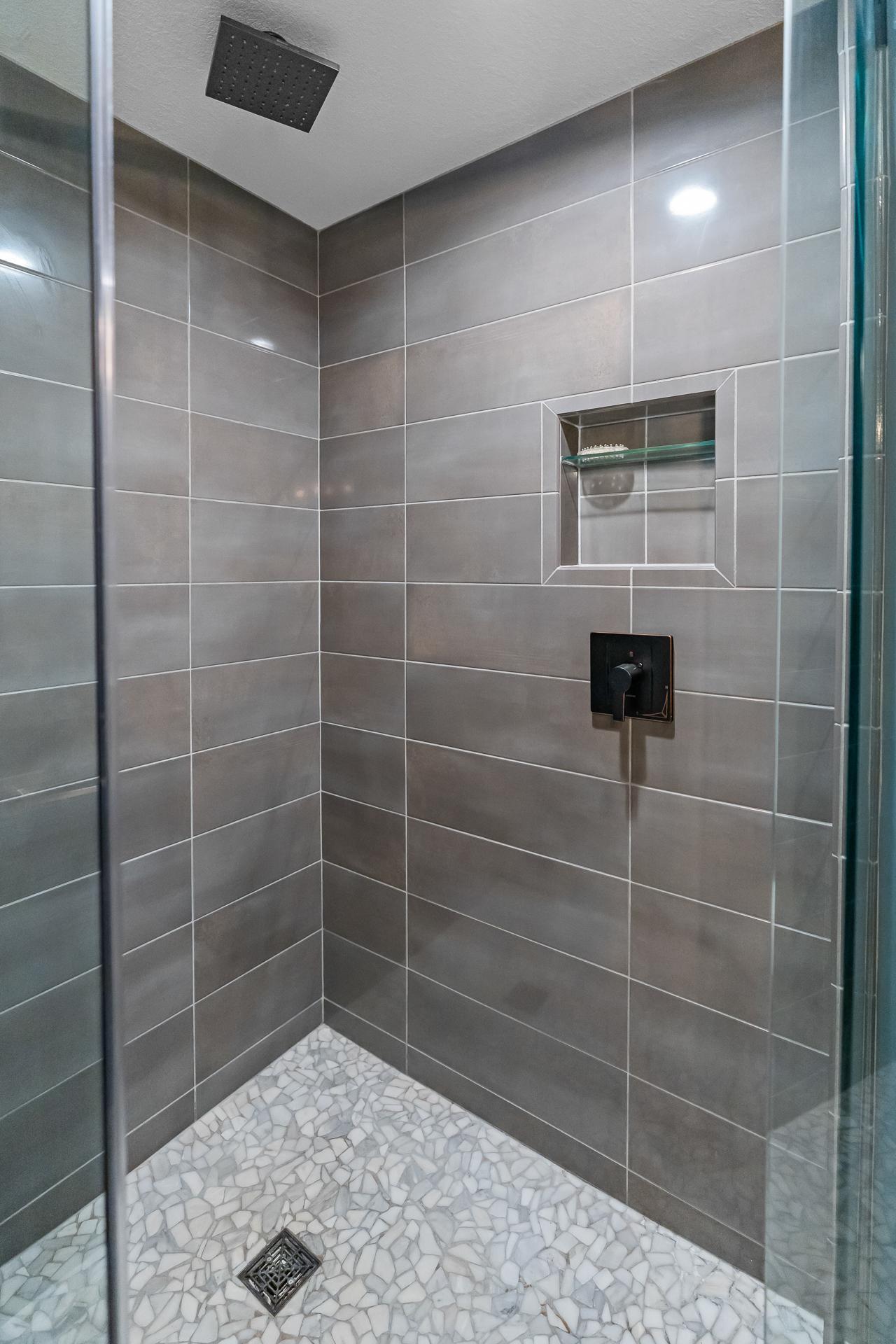 Custom tile shower surround & floor.