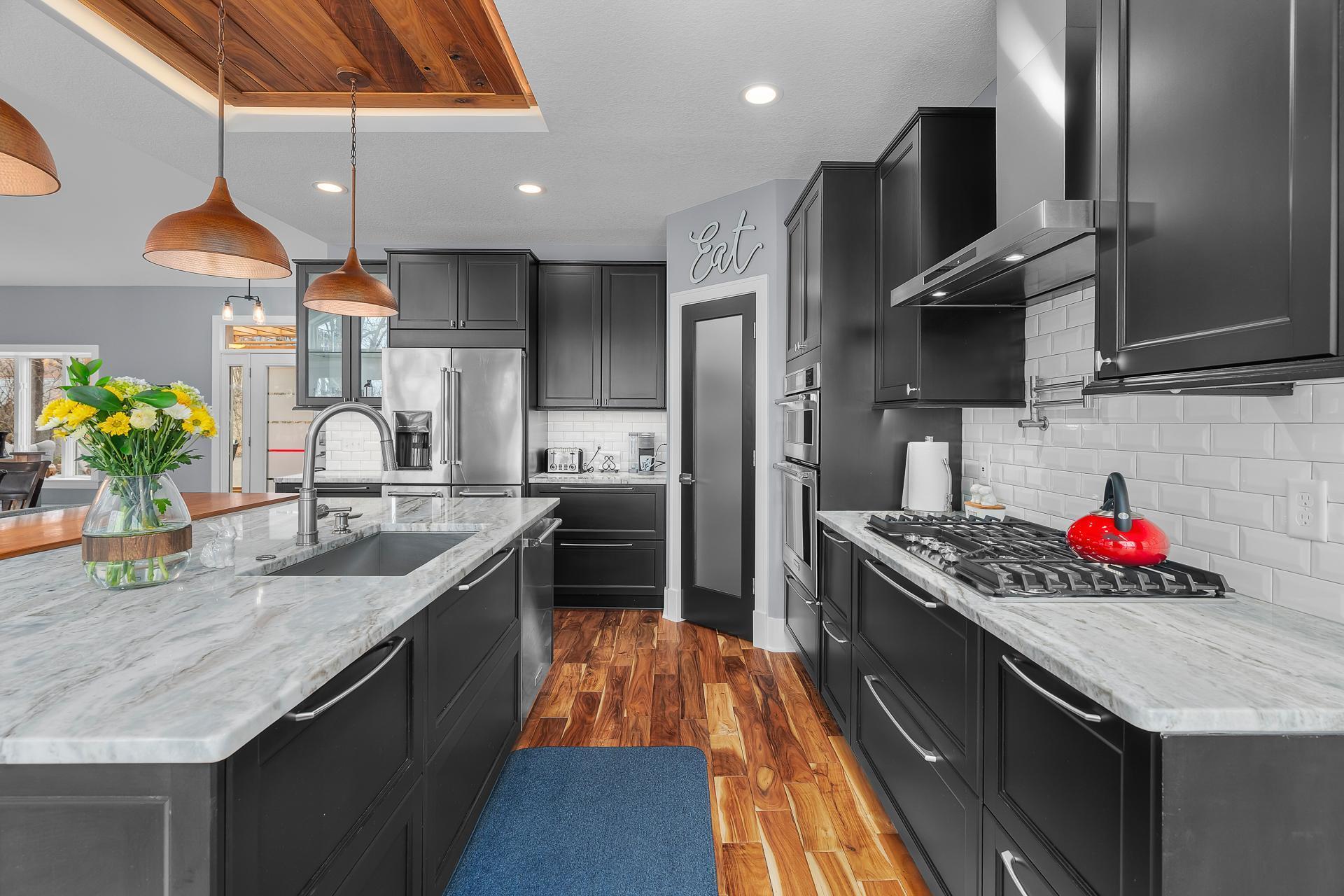 SST gas cooktop with convenient pot filler.