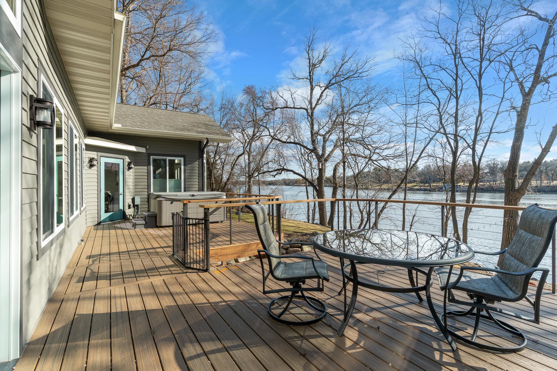 New 40x15.5 deck/railing & stairway to backyard in 2015. TREX decking 2025.