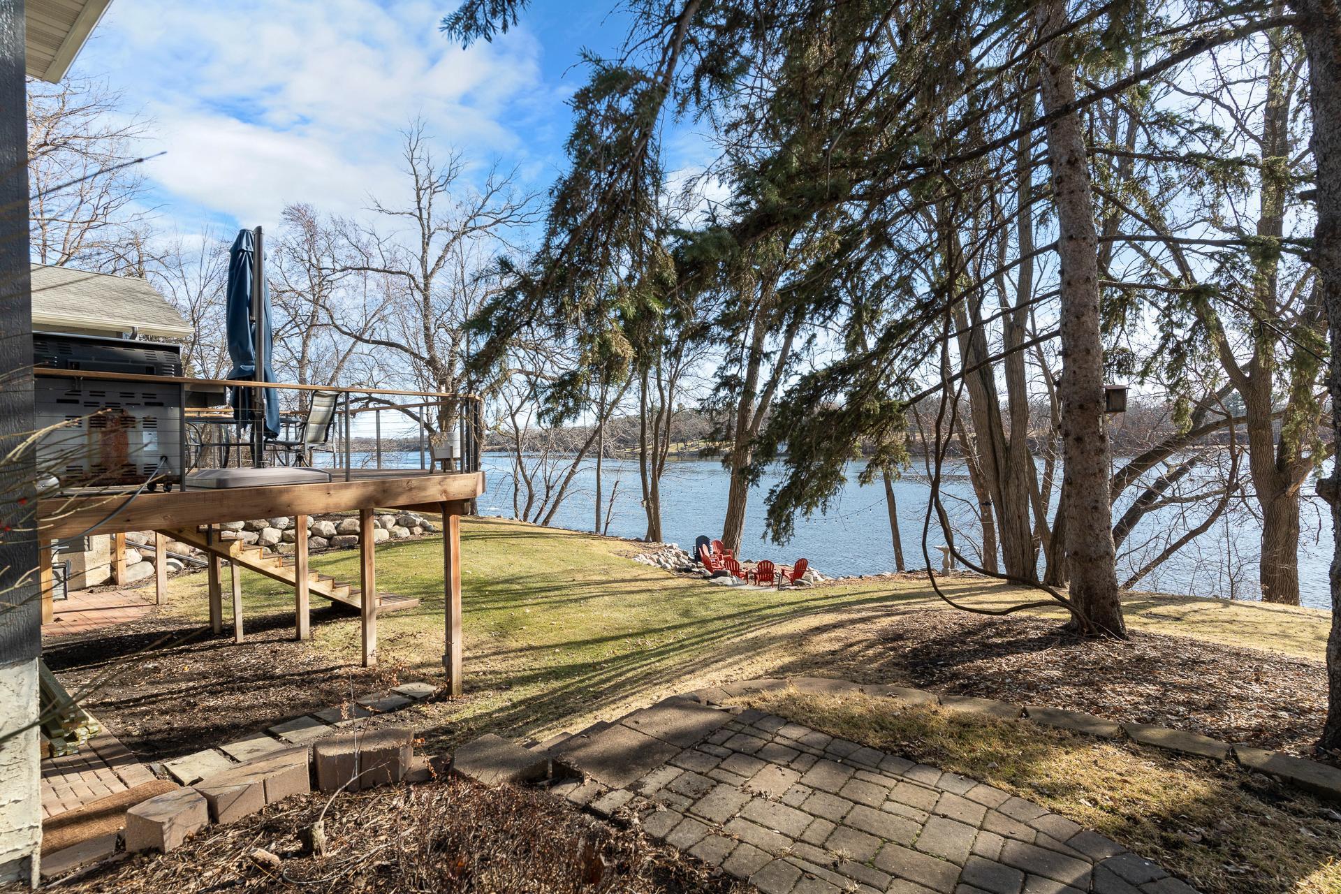 In-ground sprinkler system with added pump for river water use.