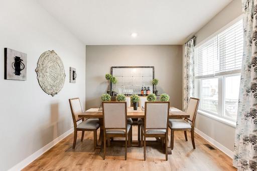 The dining room is the first room you will see as you enter this beautiful home! It could also be used as a piano room or home office.