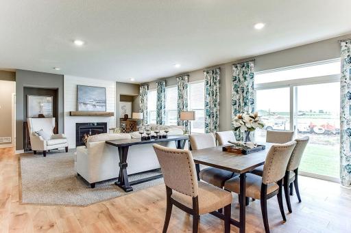 The open layout provides an optimal area to cook and entertain. Envision gathering together with friends and family in the heart of this home over the holidays!