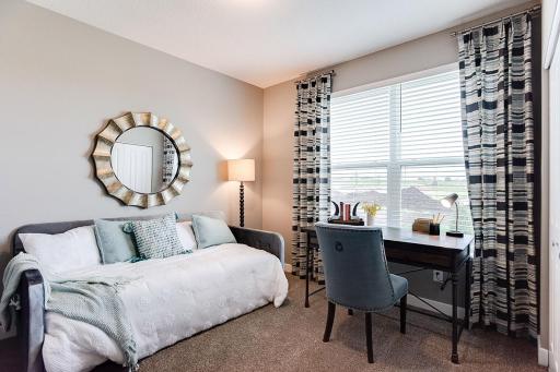 Main level bedroom and 3/4 bath. Perfect for guests or main level living.