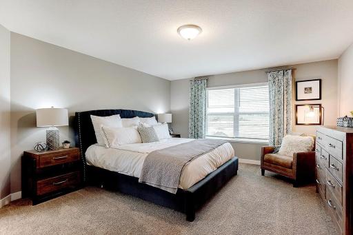The primary bedroom offers a true oasis. Enjoy this luxury private bath and two walk-in closets within the roomâs 18â x 14â space.