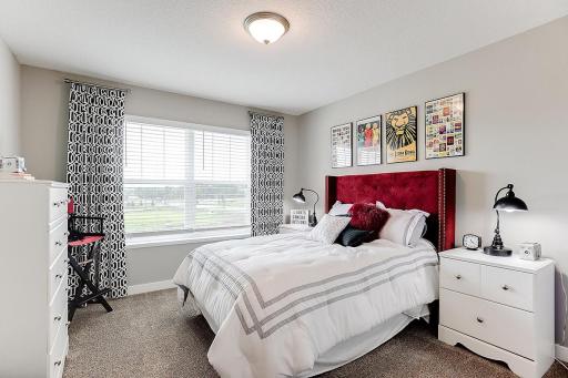 Each of the home's secondary bedrooms on the upper level come perfectly sized and all feature their own private walk-in closet.