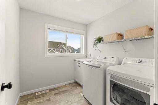 Washer & Dryer conveniently located on upper level