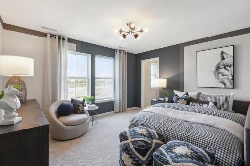 Ivy Model in Rosemount - Inviting bedroom with ample space and natural light, offering a serene retreat. Its peaceful ambiance makes it perfect for a secondary bedroom.