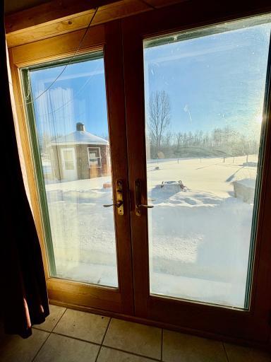 Patio doors out to fenced in back yard