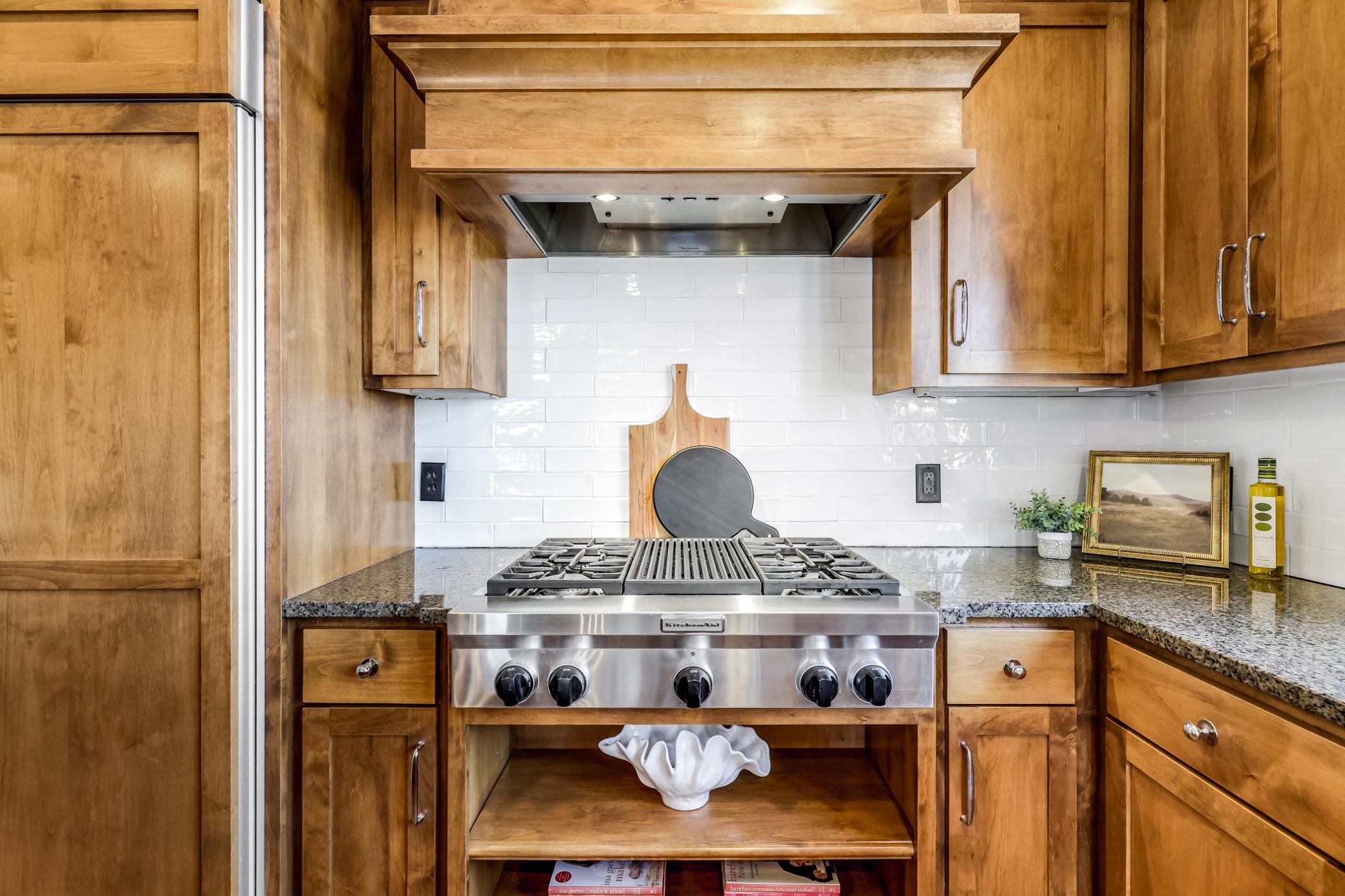 Custom KitchenAid gas cooktop (4 burners + grill).