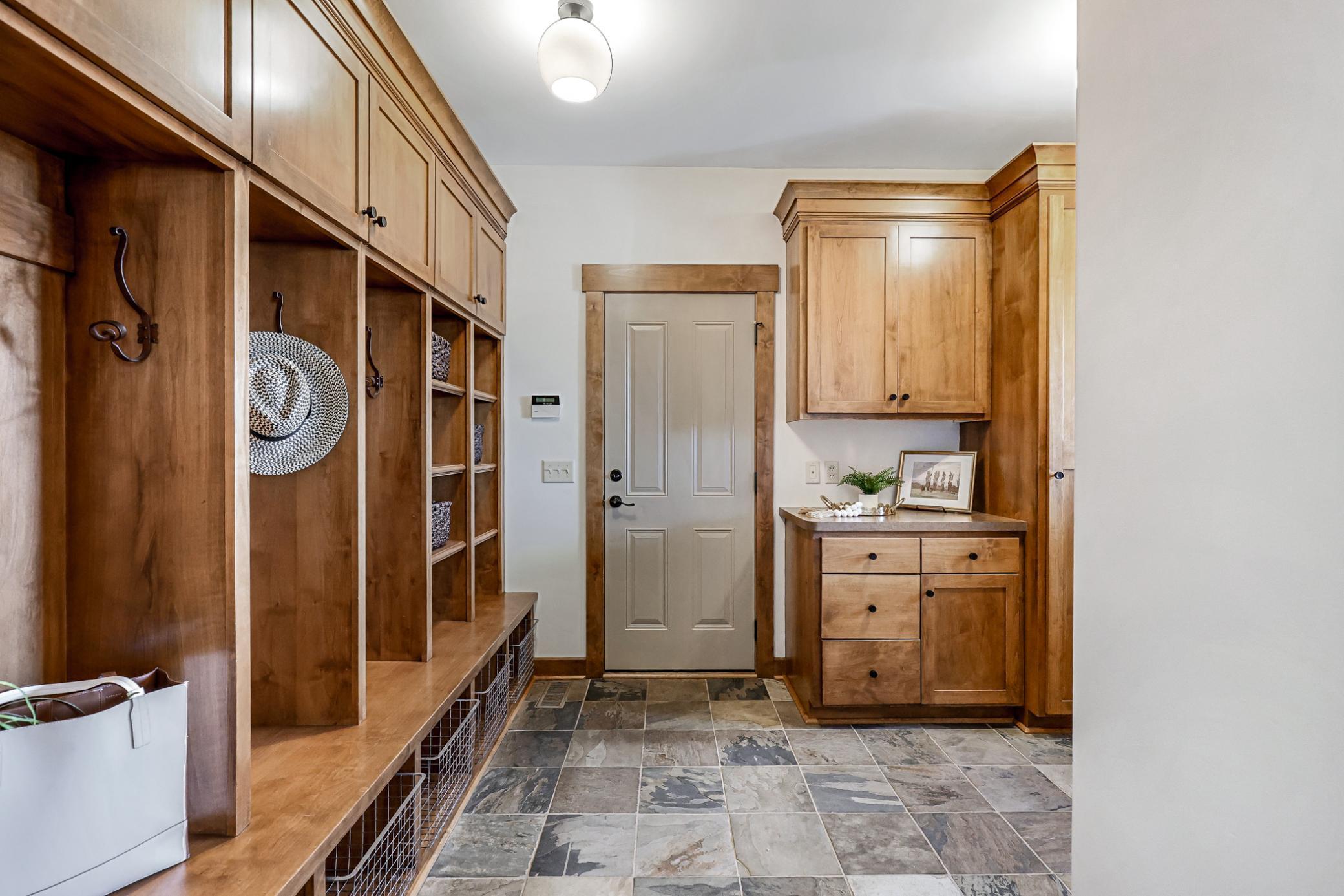 Pocket-door entry, tile floors and an incredible amount of built-in cabinetry.
