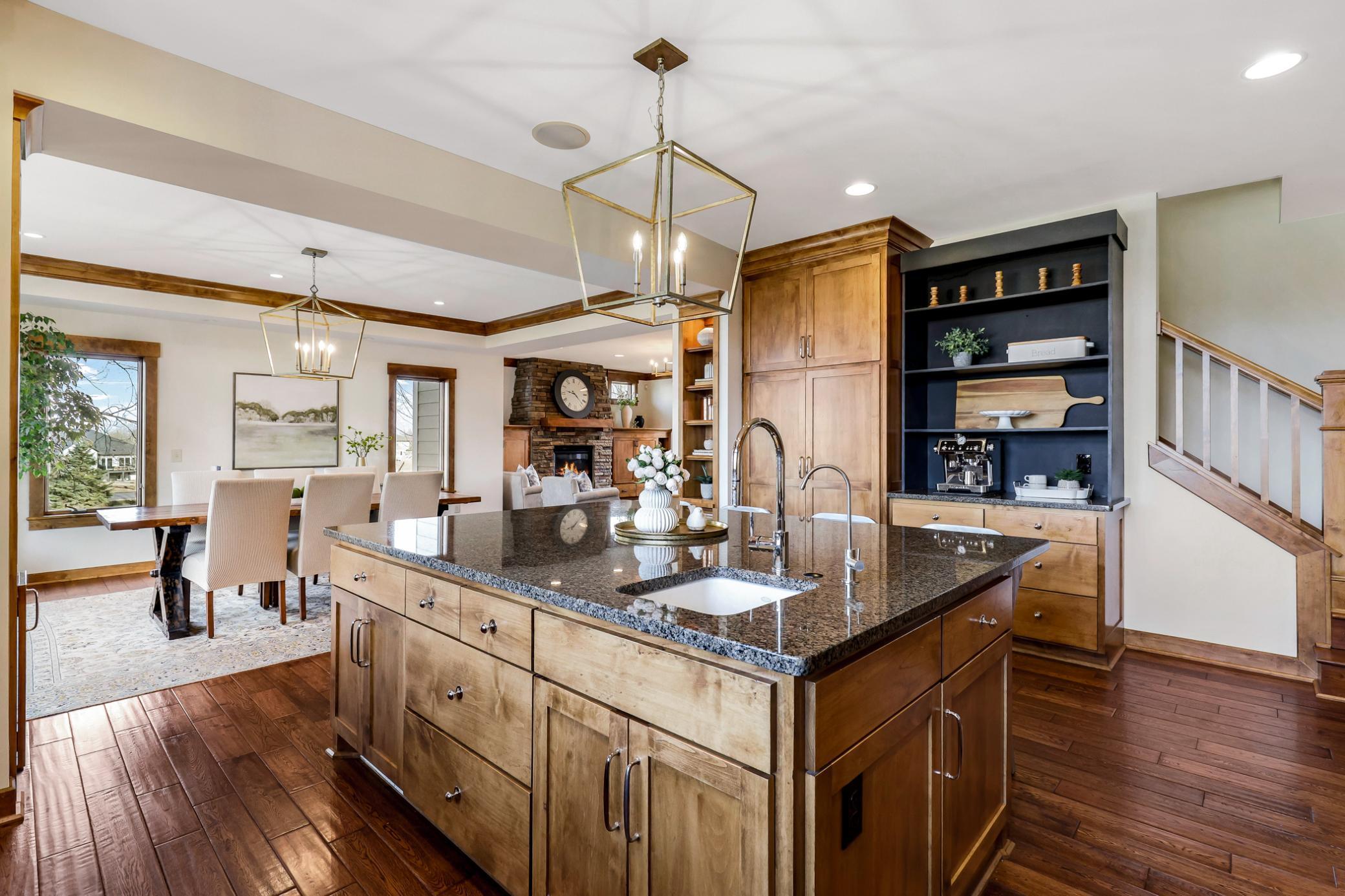 The kitchen flows effortlessly into the dining and family room.