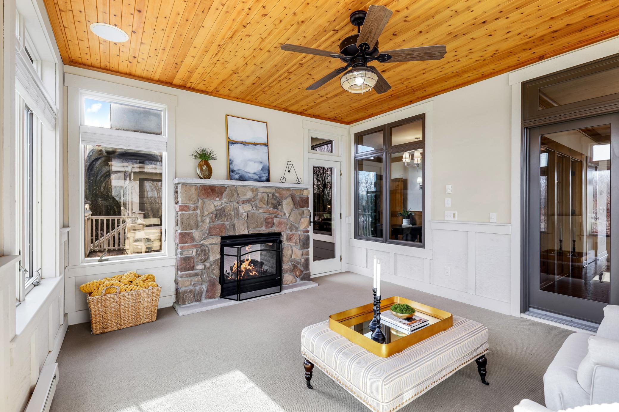 On demand heat when needed + supplemental heat from a two-sided gas fireplace (shared with the deck) with stone surround and thermal cover for colder months.