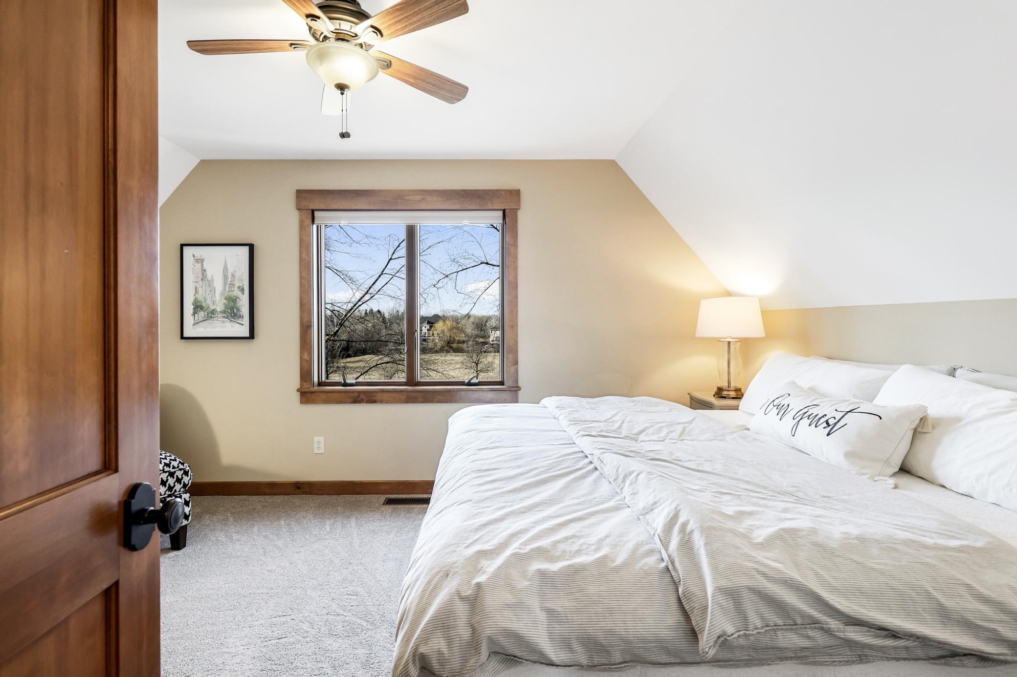 Bedroom 4: pitched ceilings, new carpet & large closet.